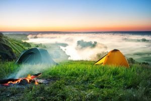 Outdoor Tips : The Ten Essentials of Camping, PTT Outdoor, tent camping on hill over misty river PQB6XP3,