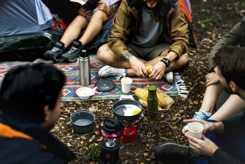 Basic Camping Tips for Beginners, PTT Outdoor, friends camping in the forest together MDJFLYB,